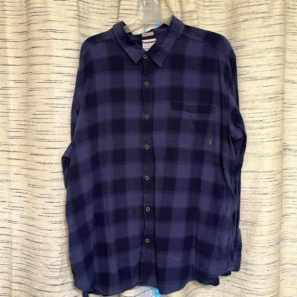 Columbia button-down flannel shirts are worn in casual outings & or outdoors